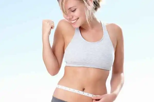 woman happy after fat reduction treatment Newcastle upon Tyne